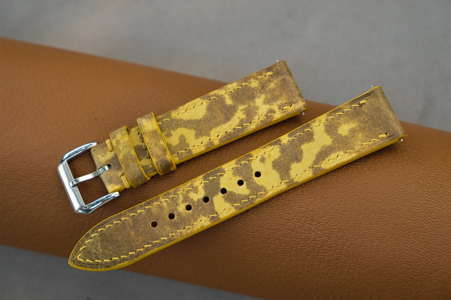 The Watch Strap Is Made From Yellow Bullfrog Leather