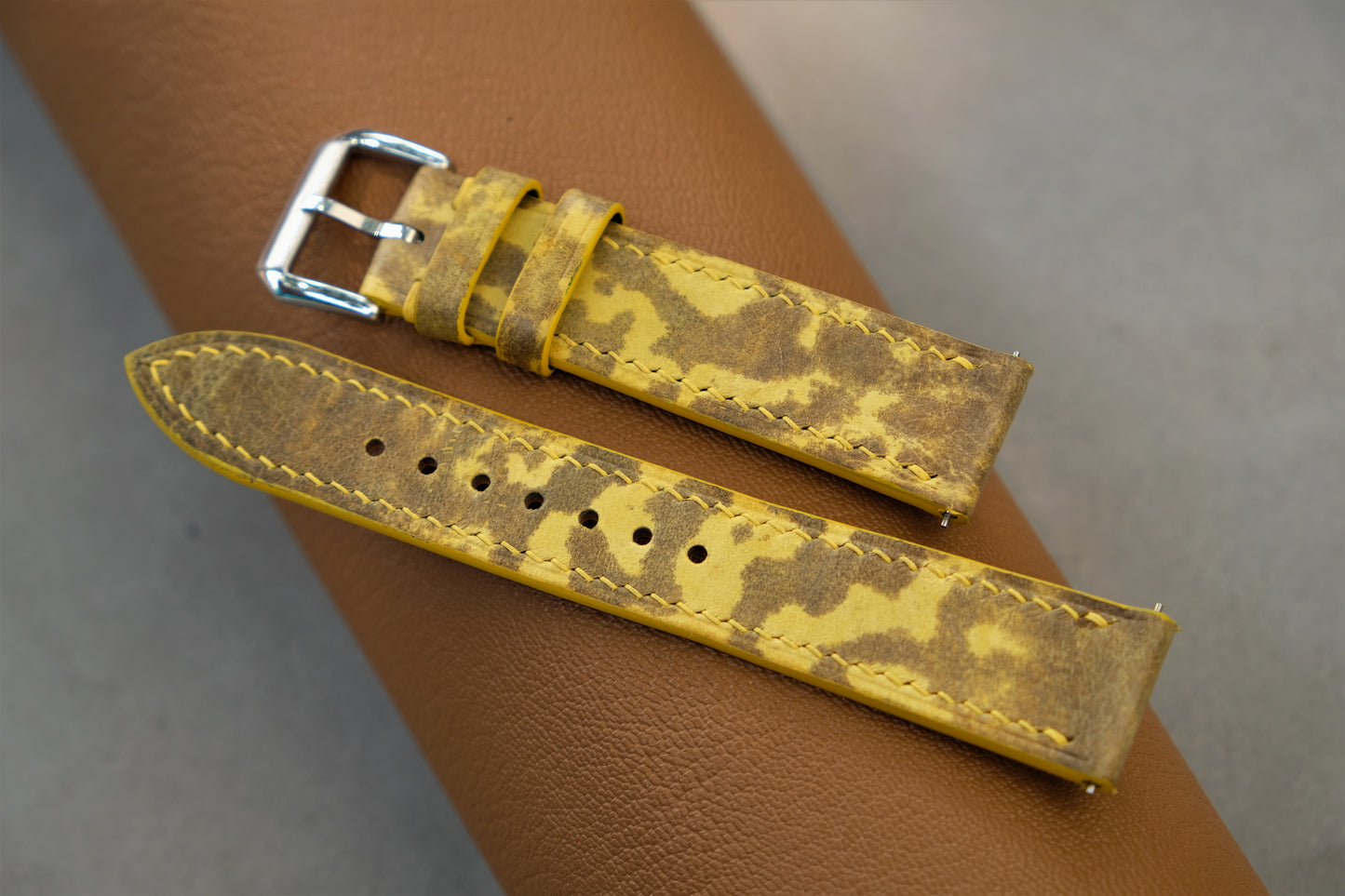 The Watch Strap Is Made From Yellow Bullfrog Leather